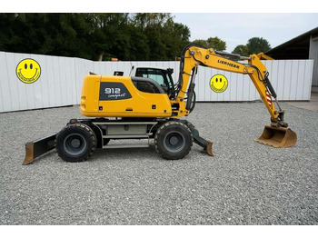 Riteņu ekskavators LIEBHERR A 912
