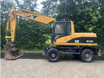 Riteņu ekskavators CATERPILLAR M316C