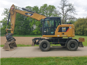 Riteņu ekskavators CATERPILLAR