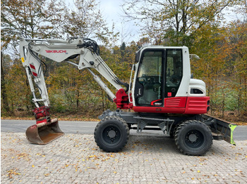 Riteņu ekskavators TAKEUCHI