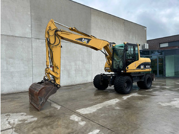Riteņu ekskavators CATERPILLAR M313C