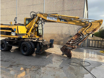 Riteņu ekskavators CATERPILLAR M315