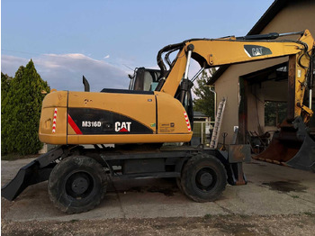 Riteņu ekskavators CATERPILLAR M316D