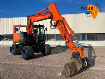 Riteņu ekskavators HITACHI ZX140W-3