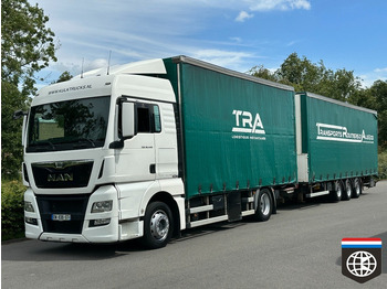 Kravas automašīna ar tentu MAN TGX 18.440