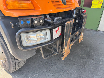 Kravas automašīna pašizgāzējs UNIMOG U400: foto 5