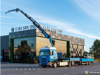 Kravas auto ar manipulatoru