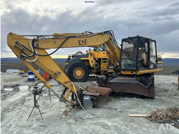 Riteņu ekskavators CATERPILLAR 312