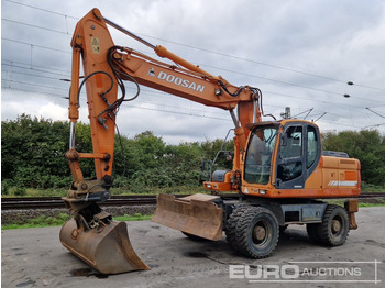 Riteņu ekskavators DOOSAN DX210