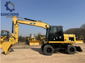 Riteņu ekskavators CATERPILLAR M320D2: foto 2 Riteņu ekskavators CATERPILLAR M320D2: foto 2