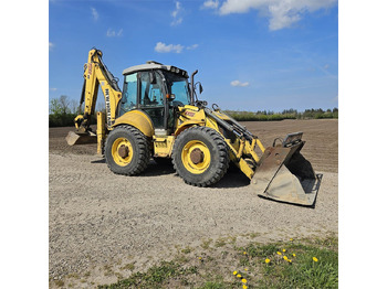 Ekskavators-iekrāvējs NEW HOLLAND