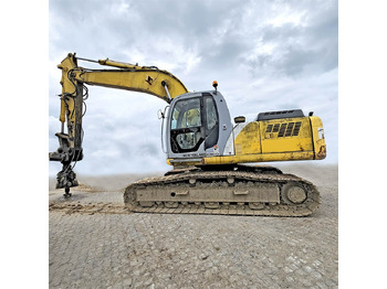 Kāpurķēžu ekskavators NEW HOLLAND