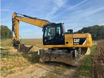 Riteņu ekskavators CATERPILLAR M316D
