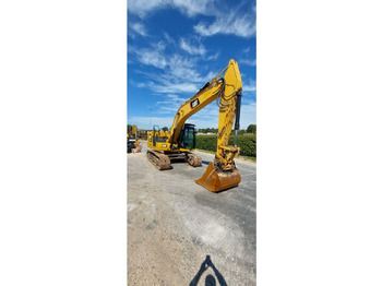 Kāpurķēžu ekskavators CATERPILLAR 323