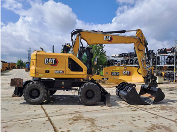 Riteņu ekskavators CATERPILLAR M315