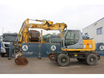 Riteņu ekskavators NEW HOLLAND