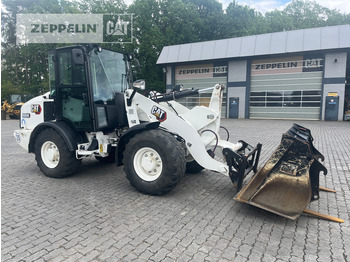 Riteņu iekrāvējs CATERPILLAR 906M