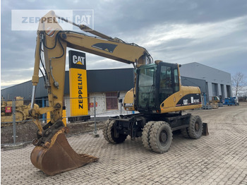 Riteņu ekskavators CATERPILLAR M316C