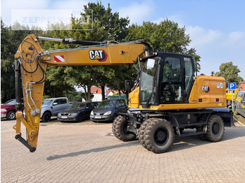 Riteņu ekskavators CATERPILLAR M318