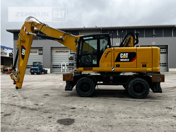 Atkritumu iekrāvējs CATERPILLAR MH3022