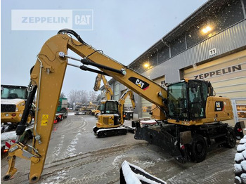 Atkritumu iekrāvējs CATERPILLAR MH3022