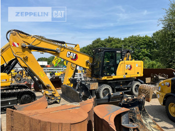 Atkritumu iekrāvējs CATERPILLAR MH3024