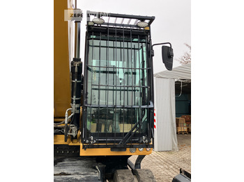 Atkritumu iekrāvējs CATERPILLAR MH3024