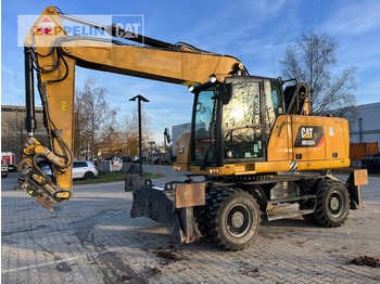 Atkritumu iekrāvējs CATERPILLAR MH3024