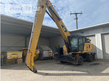 Atkritumu iekrāvējs CATERPILLAR