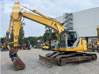 Kāpurķēžu ekskavators NEW HOLLAND
