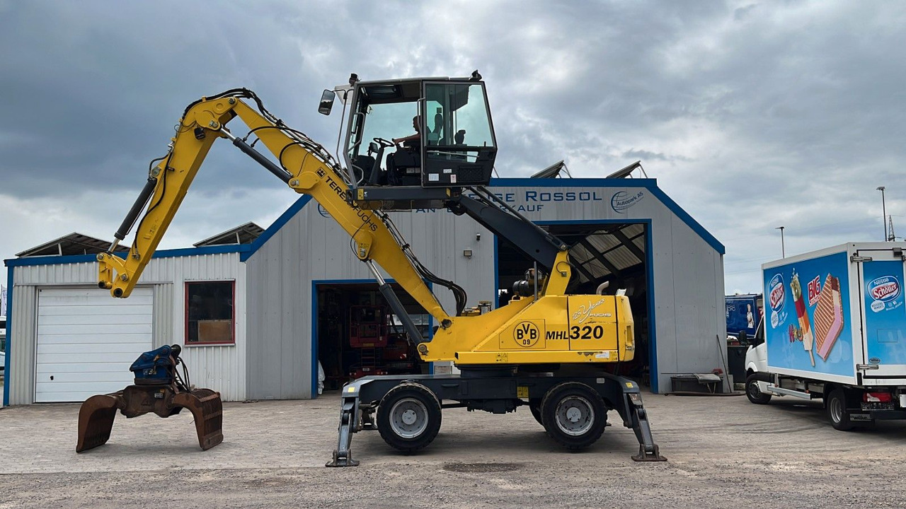 Fuchs TeRex MHL 320 D Umschlagbagger Greifer Pratzen - Atkritumu iekrāvējs: foto 2 Fuchs TeRex MHL 320 D Umschlagbagger Greifer Pratzen - Atkritumu iekrāvējs: foto 2