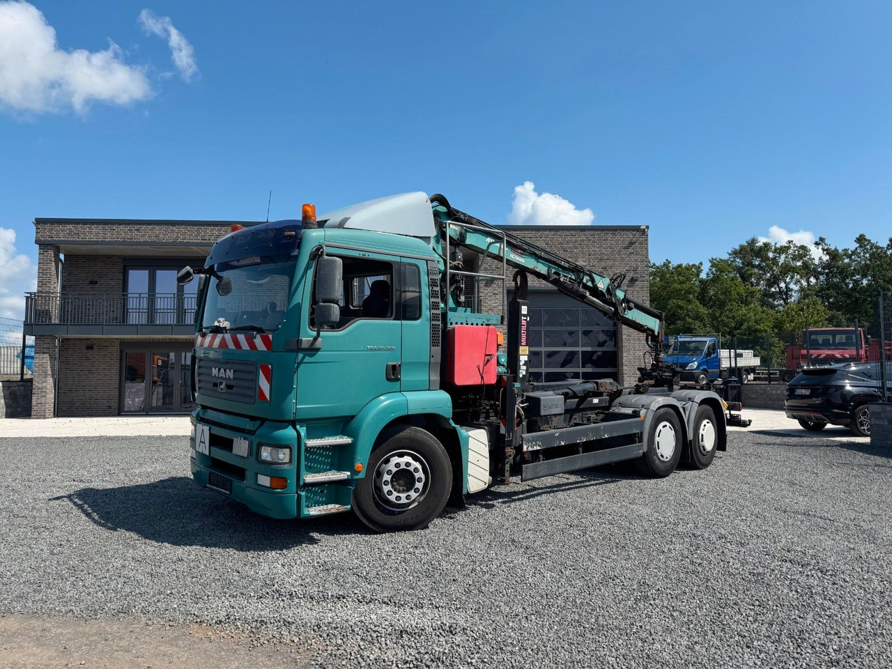 MAN TGA 26.360 Kran TeRex Multilift Fernbedienung - Pacēlājs ar āķi, Kravas auto ar manipulatoru: foto 2 MAN TGA 26.360 Kran TeRex Multilift Fernbedienung - Pacēlājs ar āķi, Kravas auto ar manipulatoru: foto 2