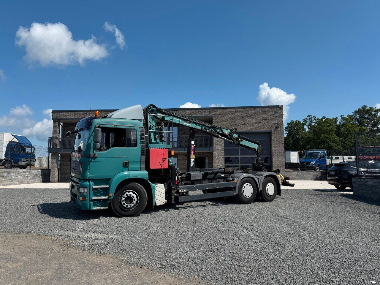 MAN TGA 26.360 Kran TeRex Multilift Fernbedienung - Pacēlājs ar āķi, Kravas auto ar manipulatoru: foto 1 MAN TGA 26.360 Kran TeRex Multilift Fernbedienung - Pacēlājs ar āķi, Kravas auto ar manipulatoru: foto 1