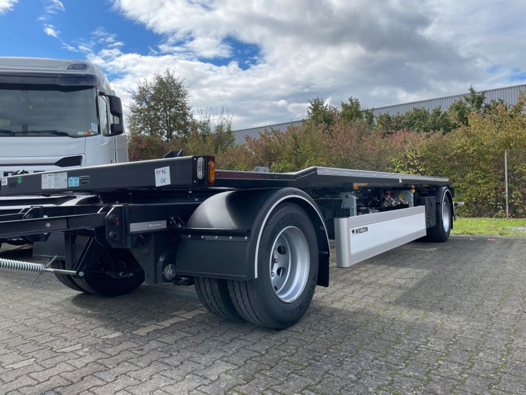 Wielton 2-Achs Außenroller-Abrollanhänger - Multilift/ Būvgružu konteinera piekabe: foto 1 Wielton 2-Achs Außenroller-Abrollanhänger - Multilift/ Būvgružu konteinera piekabe: foto 1