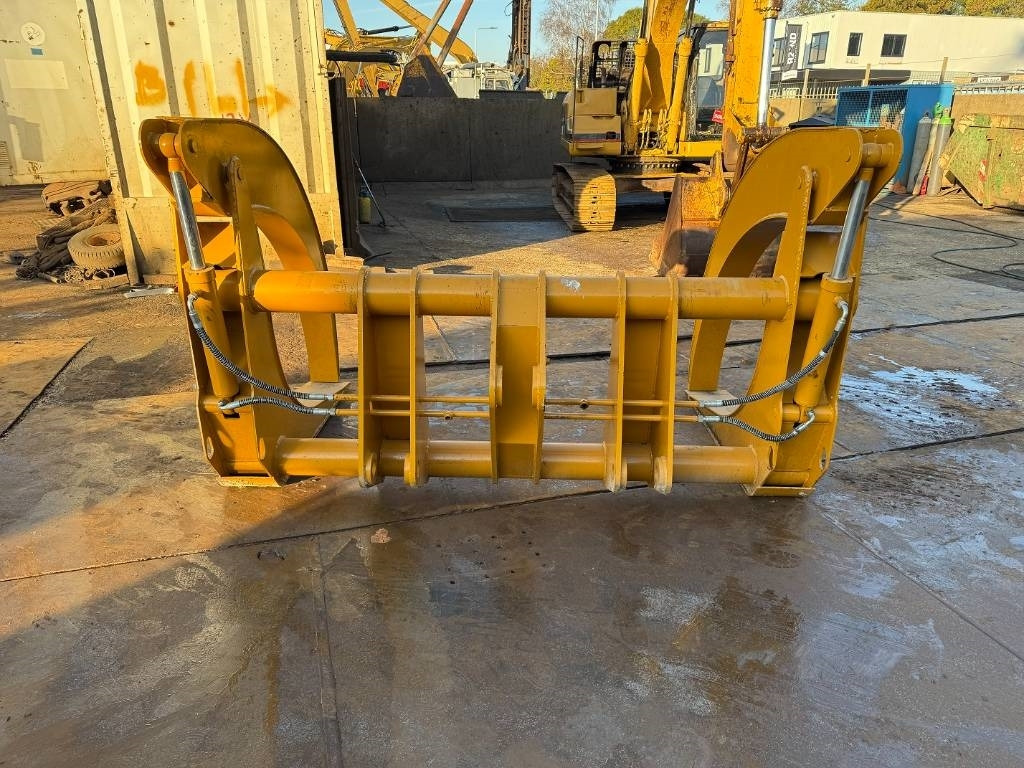 CAT 966 log forks clamp - Greiferi - Meža tehnika: foto 4 CAT 966 log forks clamp - Greiferi - Meža tehnika: foto 4