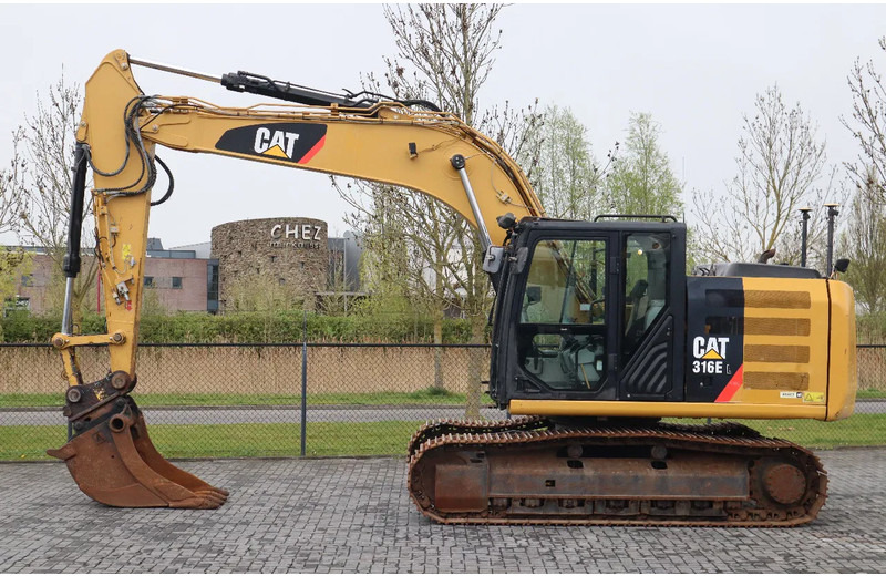 Caterpillar 316 EL | BUCKET | QUICK COUPLER | GOOD UNDERCARRIAGE - Kāpurķēžu ekskavators: foto 1 Caterpillar 316 EL | BUCKET | QUICK COUPLER | GOOD UNDERCARRIAGE - Kāpurķēžu ekskavators: foto 1