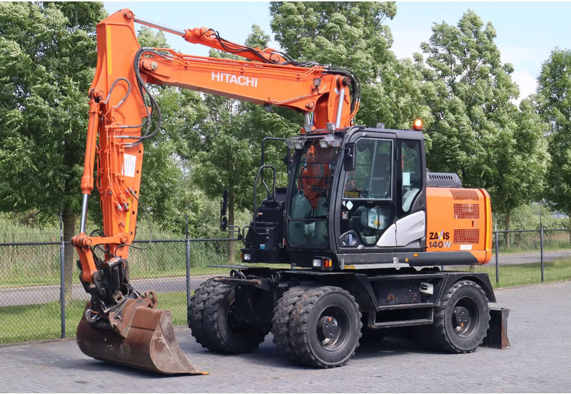 Hitachi ZX 140 W-5B | TILT QC | BUCKET | DOZER BLADE | DUTCH REG. - Riteņu ekskavators: foto 2 Hitachi ZX 140 W-5B | TILT QC | BUCKET | DOZER BLADE | DUTCH REG. - Riteņu ekskavators: foto 2