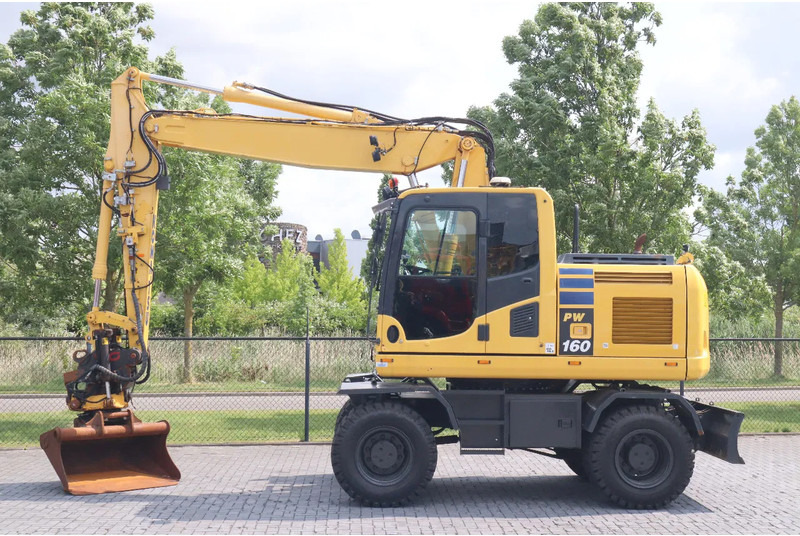 Komatsu PW 160-10 | ROTOTILT | NEW TIRES - Riteņu ekskavators: foto 1 Komatsu PW 160-10 | ROTOTILT | NEW TIRES - Riteņu ekskavators: foto 1