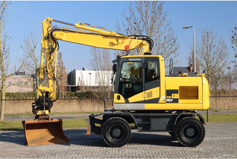 Komatsu PW160-11 | ENGCON TILTROTATOR | BUCKET | TRAILER HYDR. - Riteņu ekskavators: foto 1 Komatsu PW160-11 | ENGCON TILTROTATOR | BUCKET | TRAILER HYDR. - Riteņu ekskavators: foto 1