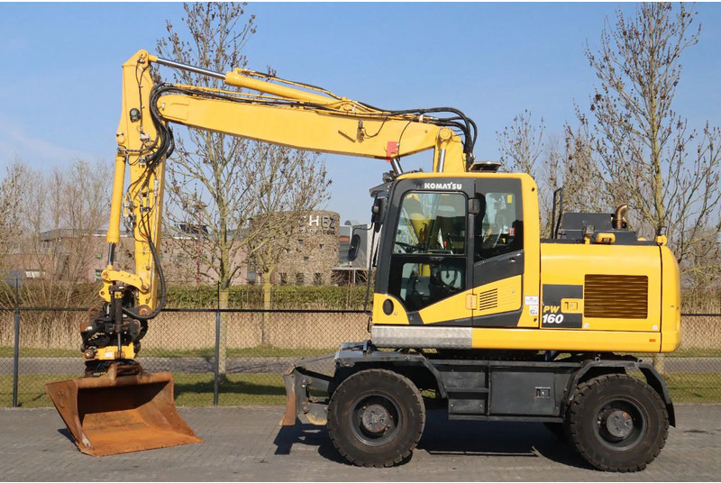 Komatsu PW160-11 | ENGCON TILTROTATOR | BUCKET | TRAILER HYDR. - Riteņu ekskavators: foto 1 Komatsu PW160-11 | ENGCON TILTROTATOR | BUCKET | TRAILER HYDR. - Riteņu ekskavators: foto 1