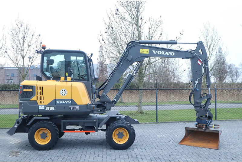 Volvo EW 60 E | DEMO | 30 KM/H | ROTOTILT + GRIPPER | BUCKET - Riteņu ekskavators: foto 4 Volvo EW 60 E | DEMO | 30 KM/H | ROTOTILT + GRIPPER | BUCKET - Riteņu ekskavators: foto 4