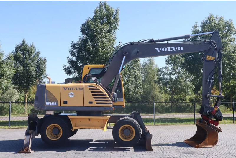 Volvo EW160B | EW 160 B | TILT ROTATOR | BUCKET | OUTRIGGERS | BLADE - Riteņu ekskavators: foto 4 Volvo EW160B | EW 160 B | TILT ROTATOR | BUCKET | OUTRIGGERS | BLADE - Riteņu ekskavators: foto 4
