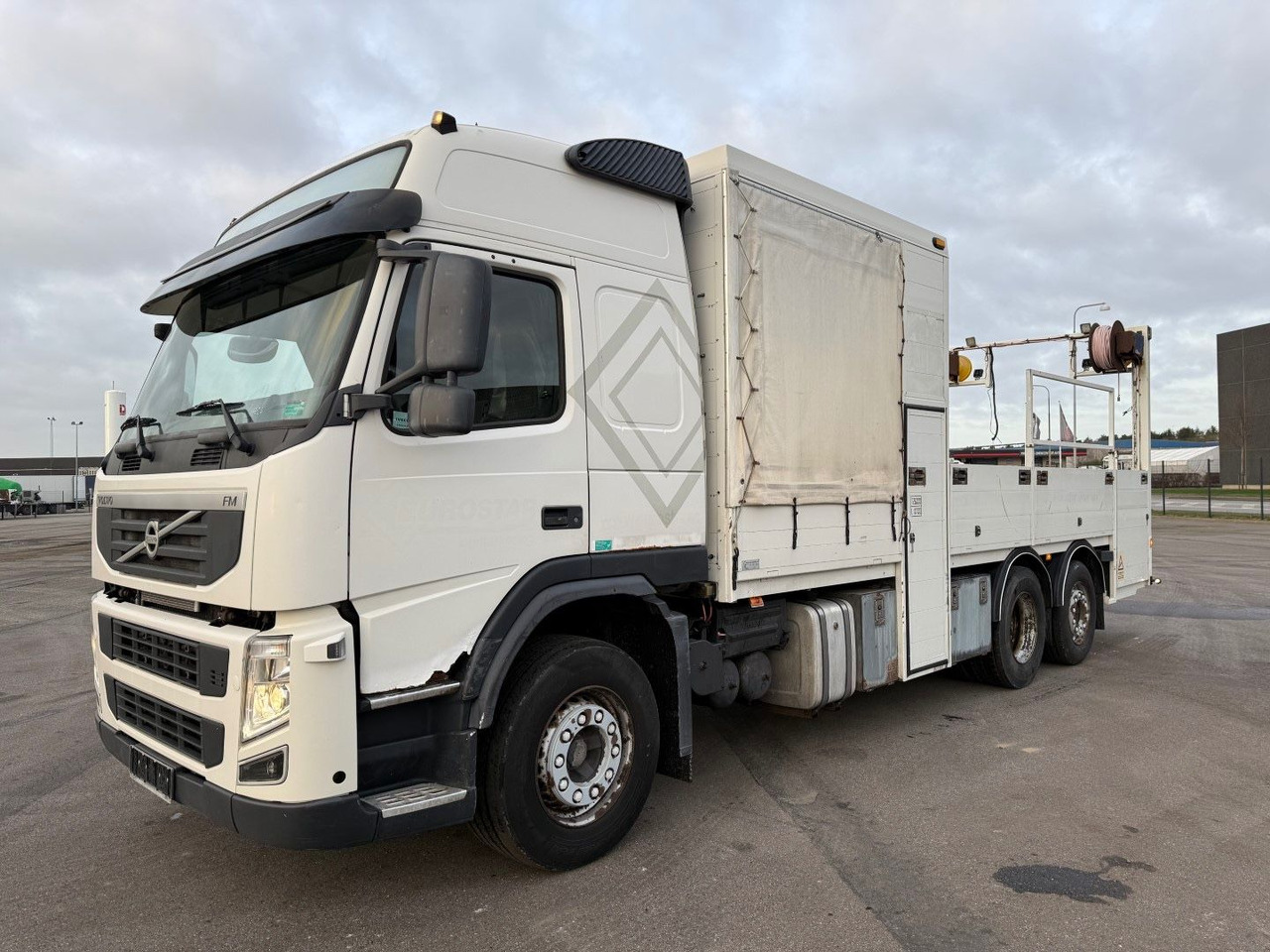 Volvo FM 410 6x2 Euro 5 - Bortu kravas automašīna/ Platforma: foto 1 Volvo FM 410 6x2 Euro 5 - Bortu kravas automašīna/ Platforma: foto 1