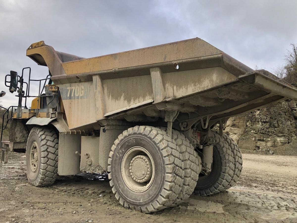 Caterpillar 770G - Karjeru pašizgāzējs: foto 1 Caterpillar 770G - Karjeru pašizgāzējs: foto 1
