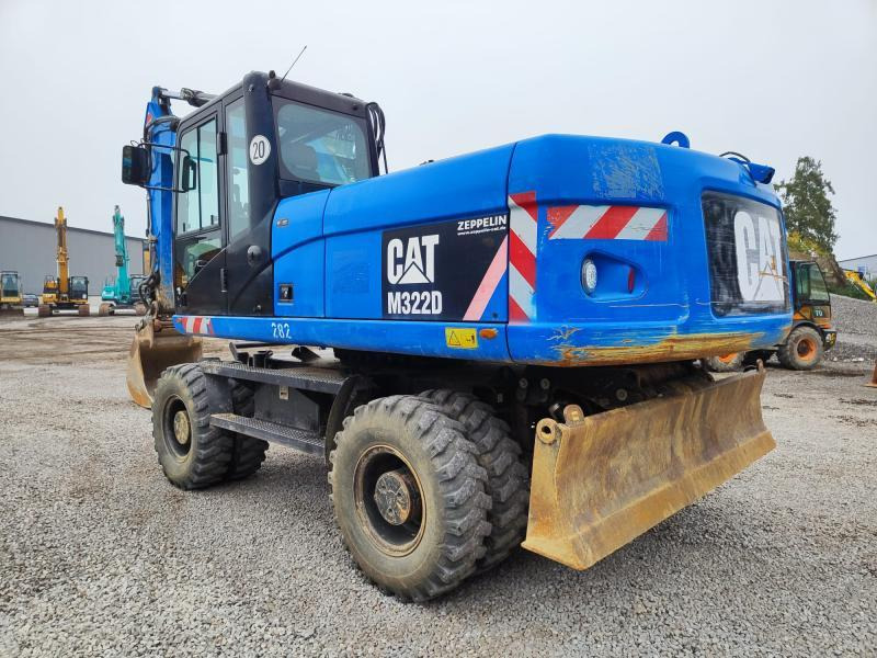Caterpillar M322D VAH - Riteņu ekskavators: foto 1 Caterpillar M322D VAH - Riteņu ekskavators: foto 1
