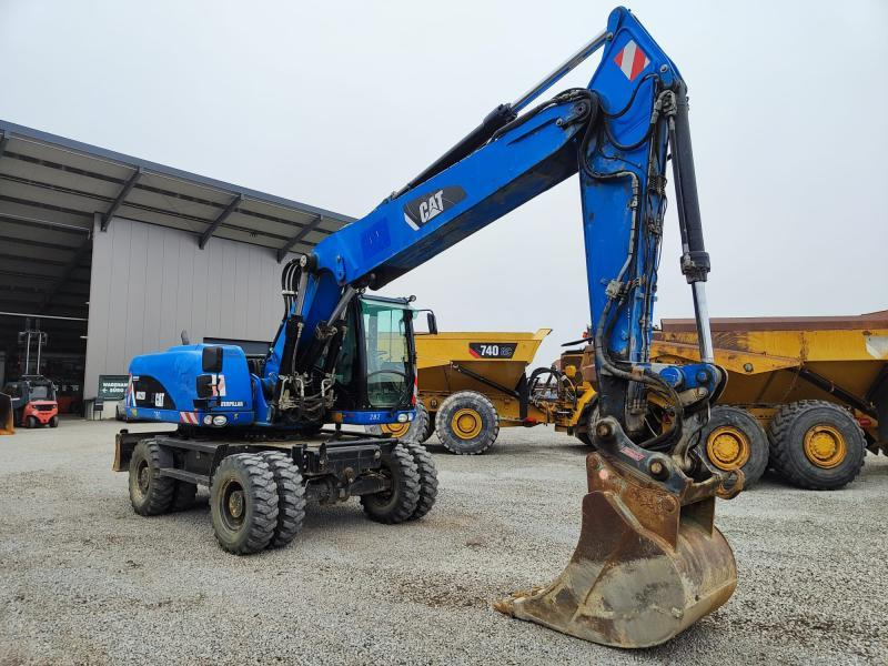 Caterpillar M322D VAH - Riteņu ekskavators: foto 3 Caterpillar M322D VAH - Riteņu ekskavators: foto 3