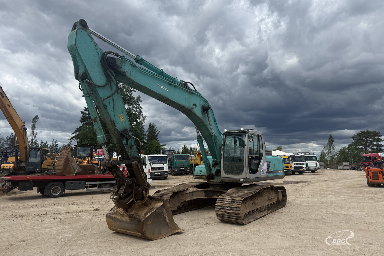 Kobelco SK230LC - Kāpurķēžu ekskavators: foto 1 Kobelco SK230LC - Kāpurķēžu ekskavators: foto 1
