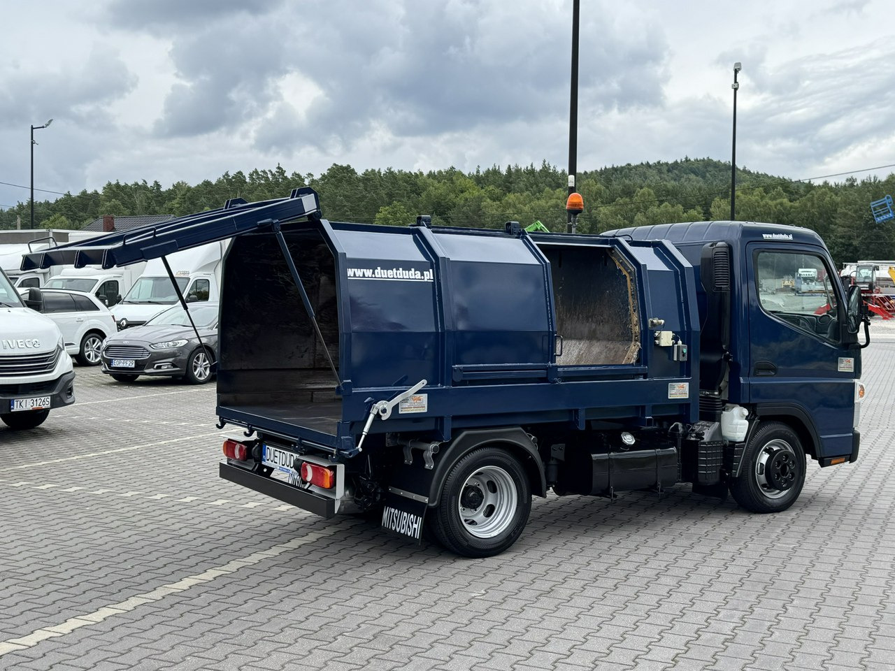 Mitsubishi Canter - Atkritumu vedējs: foto 5 Mitsubishi Canter - Atkritumu vedējs: foto 5