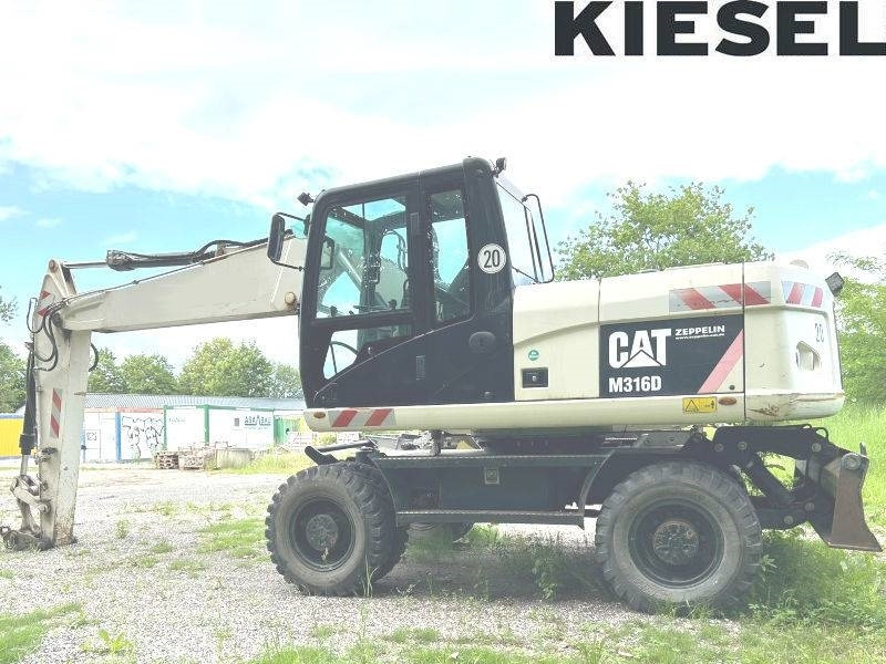 CAT M 316 D - Riteņu ekskavators: foto 1 CAT M 316 D - Riteņu ekskavators: foto 1