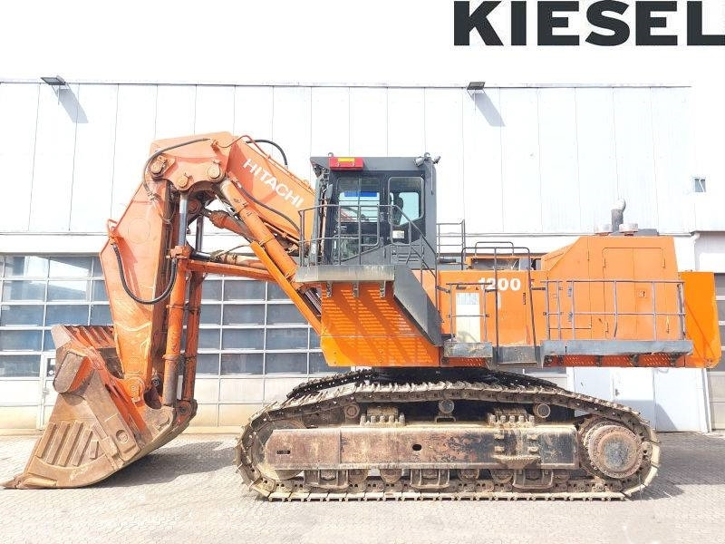 Hitachi EX 1200-6 - Ekskavators: foto 1 Hitachi EX 1200-6 - Ekskavators: foto 1